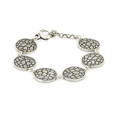 Prodotti BRACCIALE IN ARGENTO CON ELEMENTI ROTONDI TEXTURE COCCODRILLO
